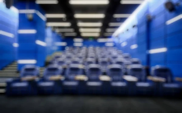 Panorama of an empty cinema hall as creative abstract blur backg