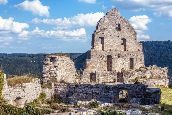 Ruins of medieval Hohenurach Castle near Bad Urach, Germany. Scenery of abandoned German castle on mountain top in summer. This old castle is tourist attraction of Baden-Wurttemberg.