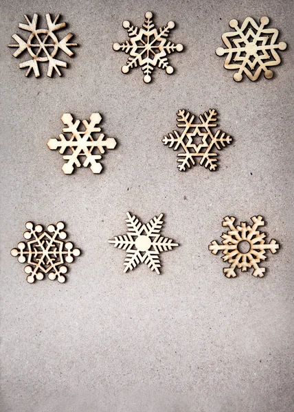 Flocos Neve Decorativos Madeira Fundo Papel Artesanal Como Decoração Natal — Fotografia de Stock