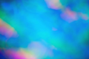 Pembe-Mavi degrade ışıklarla bulanıklık. Soyut daire arka plan kullanım için Bokeh ışık efekti.