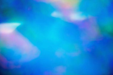 Pembe-Mavi degrade ışıklarla bulanıklık. Soyut daire arka plan kullanım için Bokeh ışık efekti.