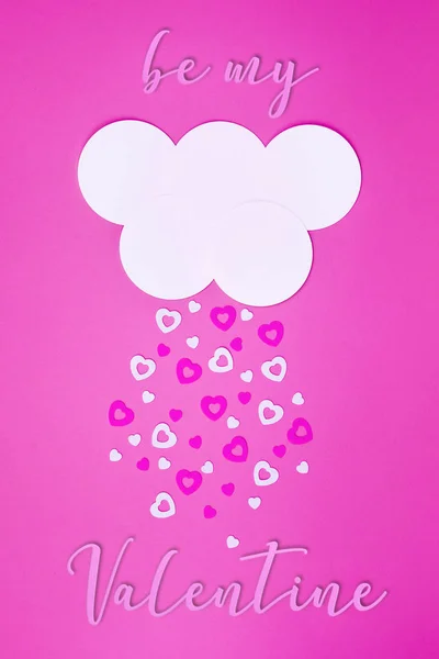 White cloud on pink background with pink and white hearts falling down and lettering Be My Valentine.Trendy simple paper cut Valentine\'s day template for invitations, greeting cards, posters, blogs