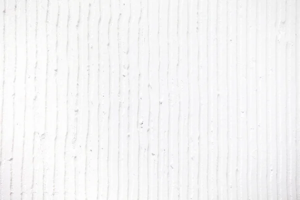 Strukturierter weißer Hintergrund mit vertikalen Linien und Streifen aus Gips — Stockfoto