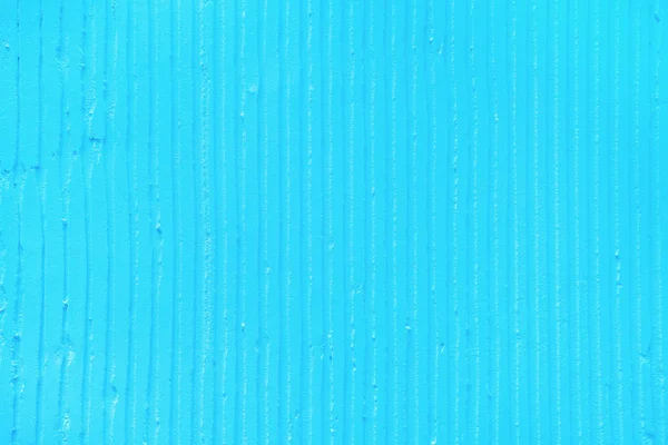 석고 수직 라인과 줄무늬와 질감 파란색 배경 — 스톡 사진