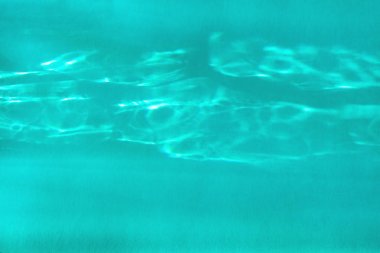 ışık ve gölgeler kostik ile mavi renkli soyut arka plan 