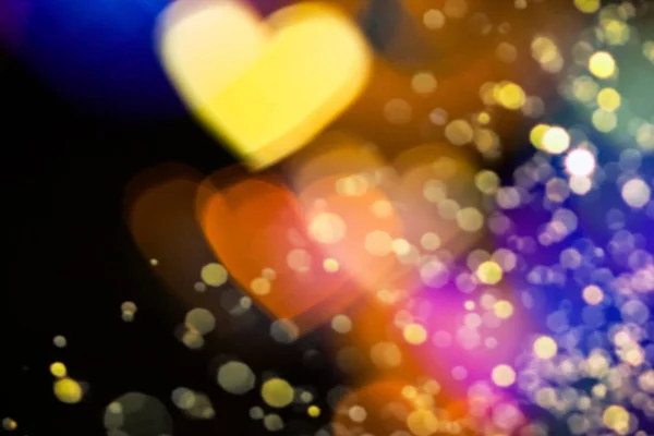 Corazón colorido fondo bokeh — Foto de Stock