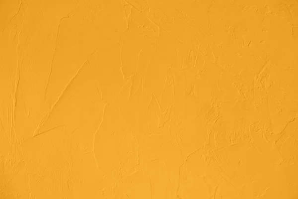 Gesättigte gelb gefärbte Beton mit geringem Kontrast strukturierten Hintergrund — Stockfoto