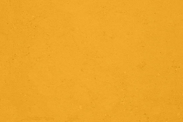 Saturated yellow colored low contrast Concrete textured backgrou — Stock Photo, Image
