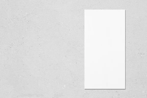 white vertical rectangle price-list or menu mockup on grey concr