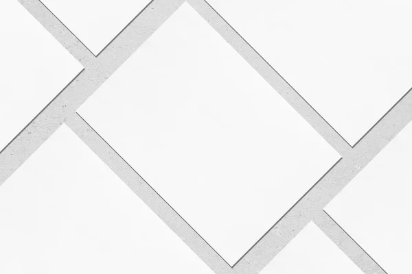 Closeup of empty white rectangle poster mockups lying diagonally — Stock Photo, Image