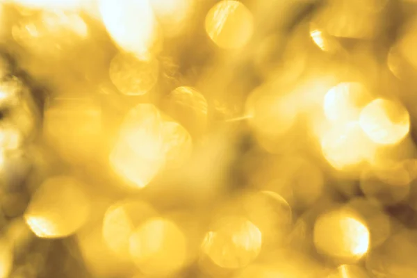 Arany körök bokeh ünnepi csillogás háttér — Stock Fotó