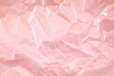 Buruşuk pembe saten kağıt dokusu
