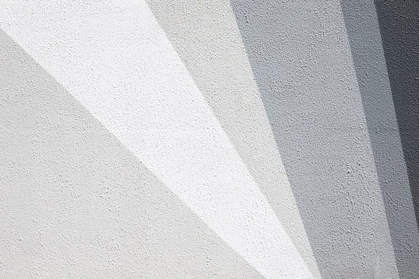 Closeup of gradient gray urban wall texture. Modern pattern for wallpaper design. Creative urban city background. Abstract open composition. Minimal geometric style, solid colors