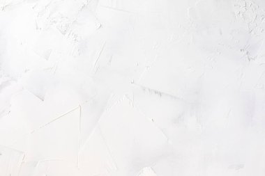 Tarafsız beyaz renkli düşük kontrastlı Beton, arka planda pürüzler ve düzensizlikler var..