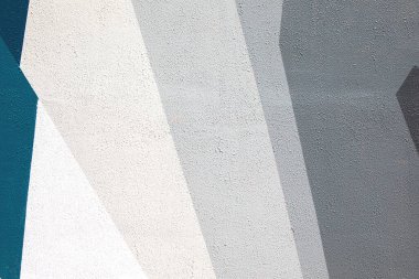 Renkli kentsel duvar dokusuna yakın çekim. Duvar kağıdı tasarımı için modern model. Yaratıcı şehir geçmişi. Soyut açık kompozisyon. En düşük geometrik biçim, katı renkler