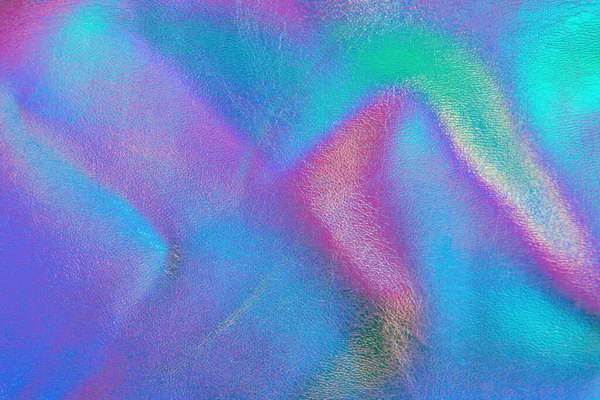 レトロホログラフィック金属革の背景 要約カラフルな鮮やかな虹色のグラデーション レトロな未来的なデザイン 本物の質感のバイオレット ピンク ミント 傷や凹凸のある青の色 — ストック写真
