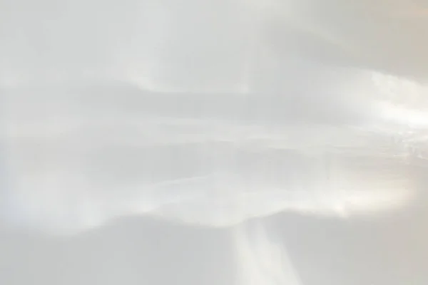 Schatten und Licht ätzende Wirkung auf einer weißen Wand — Stockfoto