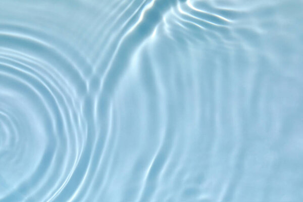 transparent blue colored clear calm water surface texture 