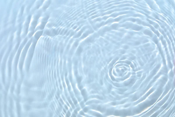 Transparent blue colored clear calm water surface texture — Stock Photo, Image