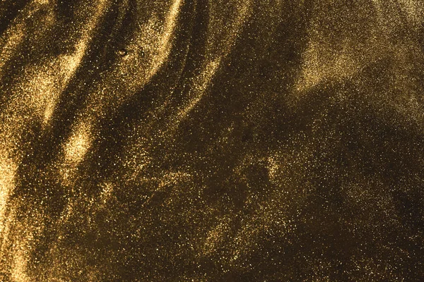 Black and gold festive shimmering dust background — Stock Photo, Image