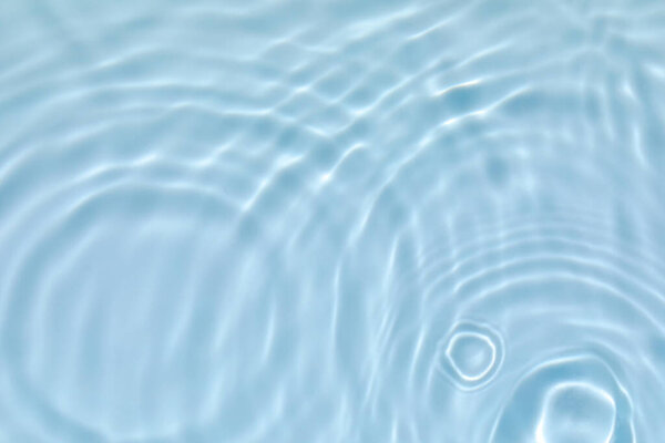 transparent blue colored clear calm water surface texture 