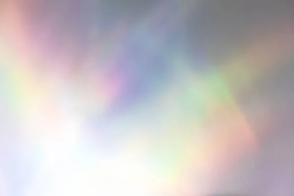 白墙上模糊的彩虹光折射纹理 — 图库照片