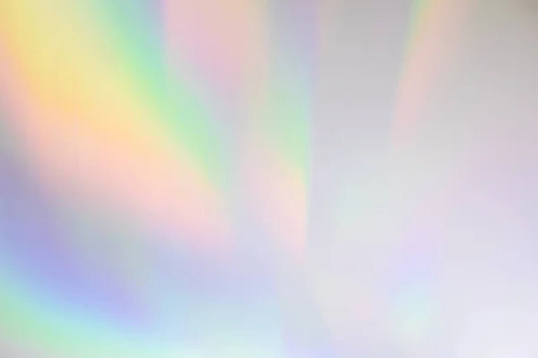 Textura de refracción de luz de arco iris borrosa en pared blanca — Foto de Stock