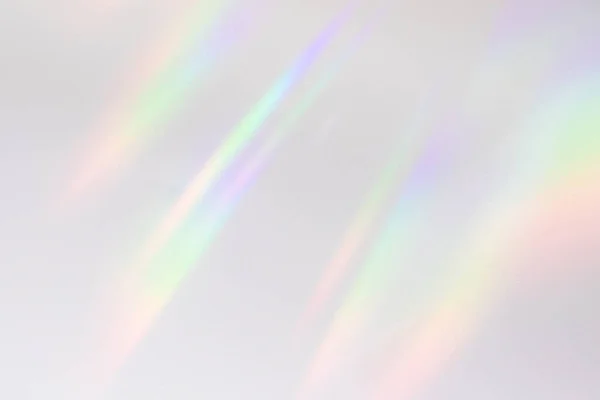 Textura de refracción de luz de arco iris borrosa en pared blanca — Foto de Stock