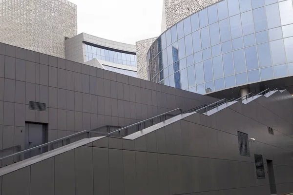 A fragment of the modern building with mirror glasses. Horizontally. Vertically.