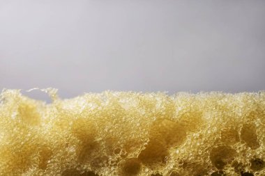 Sıkı bez ve delikleri ile yakın çekim sünger