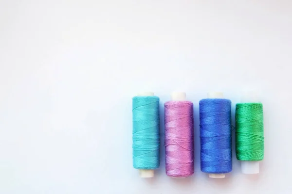 Multicolored Thread Coils Pink Blue Background Sewing Supplies Accessories Needlework — Stock Photo, Image