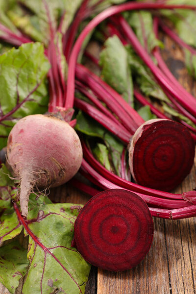 close-up photo of beetroot and leaves