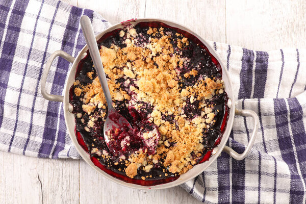 berry fruit crumble on table 