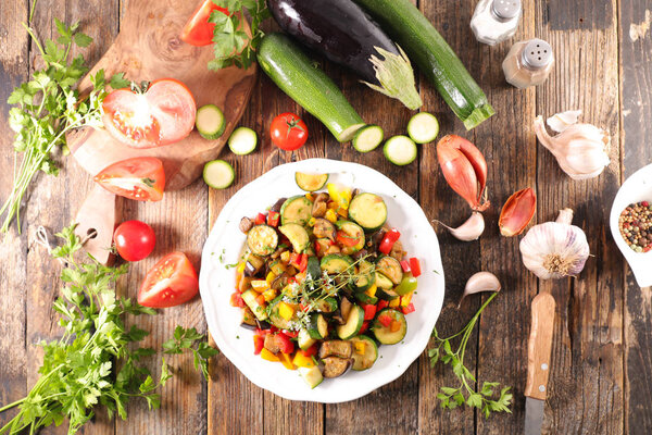 grilled vegetables with ingredients on table