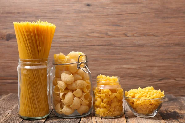 Assorted Raw Pasta Wooden Background — Stock Photo, Image