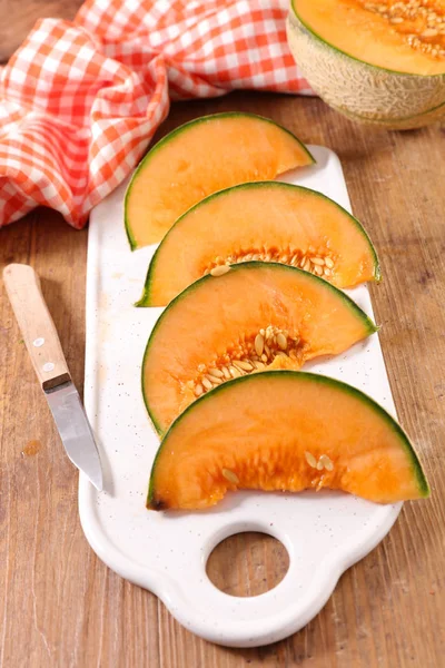 Fette Melone Fondo Legno — Foto Stock