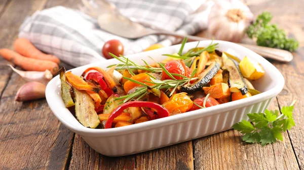 roasted vegetables and rosemary close up shot