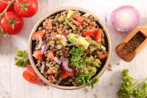lentil salad with tomatoes, onion and avocado