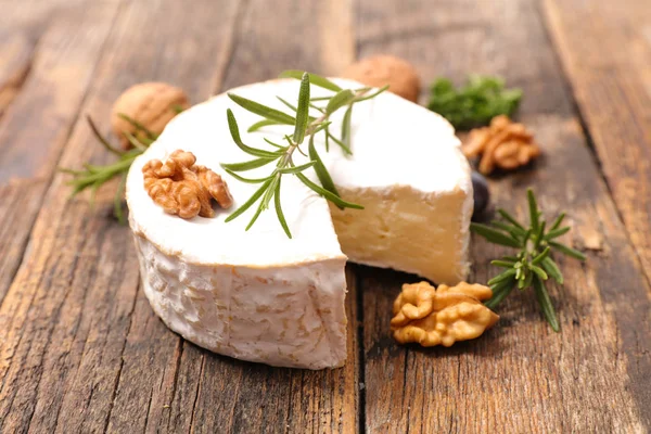 Camembert Cheese Walnuts Herbs Wooden Surface — Stock Photo, Image