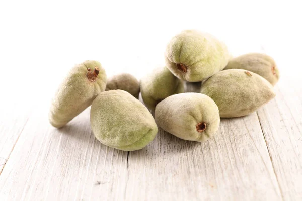 Fresh Raw Pile Almonds Wooden Table — Stock Photo, Image