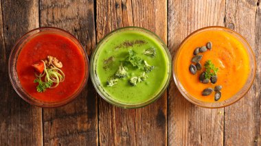 Top view of assorted vegetable soup in bowls 