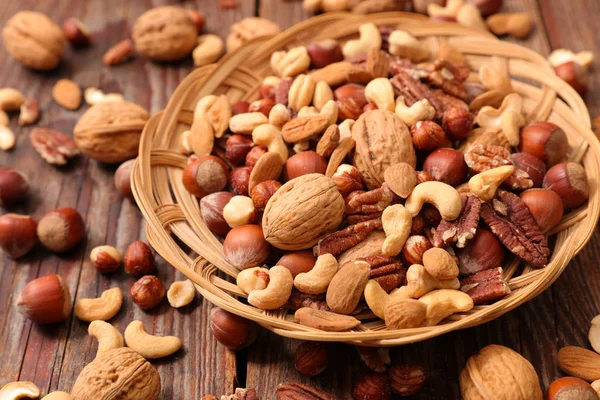 Mixed Dried Nuts Wooden Table — Stock Photo, Image