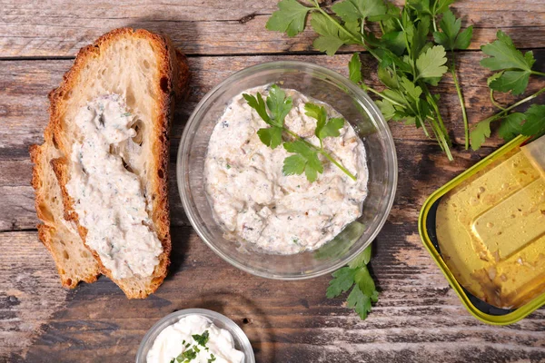 bread with fish spread and parsley
