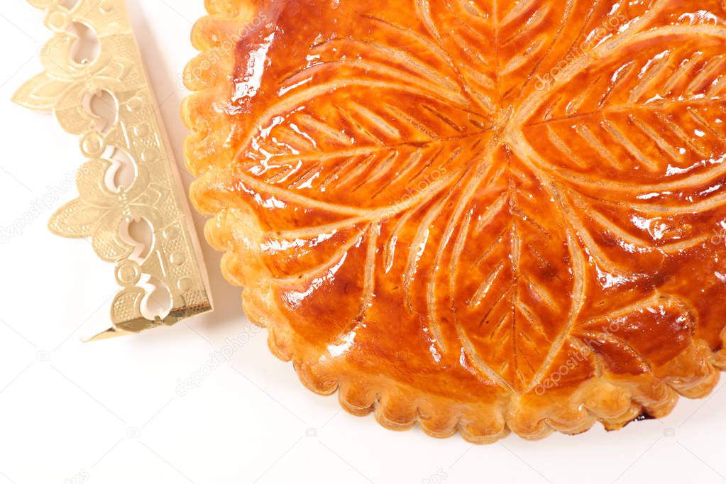 close up view of epiphany cake on white background