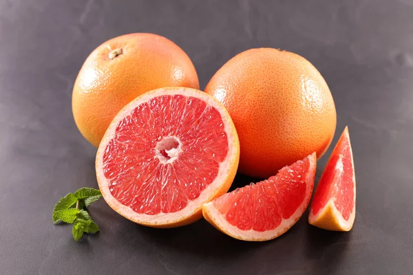 close up view of fresh red grapefruits