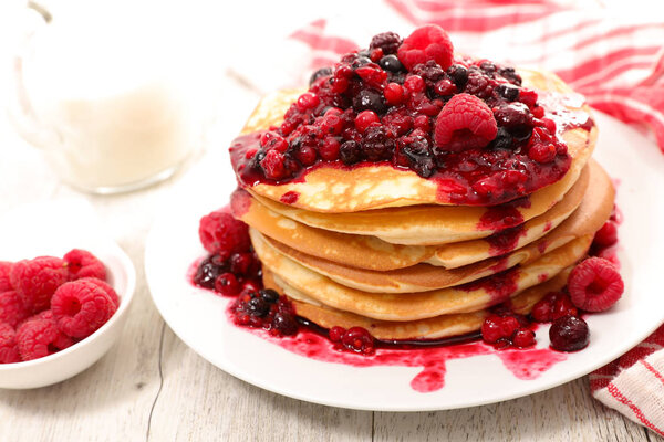 pancake with berry fruit sauce