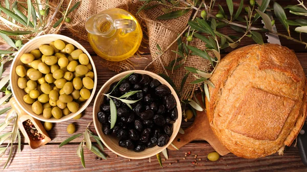 green and black olive with bread