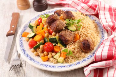 couscous with vegetables and meatball clipart