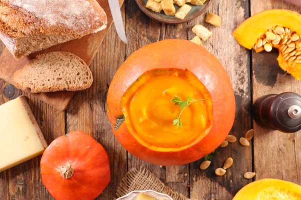 Pumpkin soup in bowl with bread and cheese — Stock Image Pumpkin Soup Bowl Bread Cheese Stock Picture