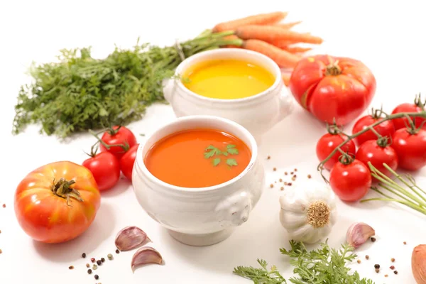 carrot soup and tomato soup with ingredients